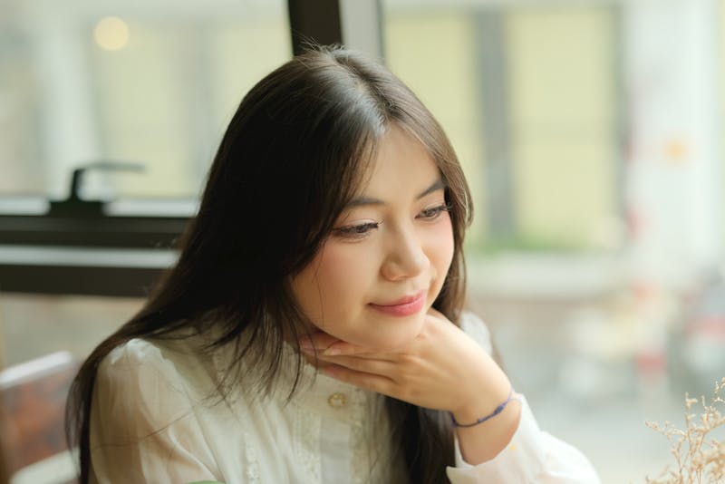 Sarah, head chef at Punch Pizza, smiling in the kitchen